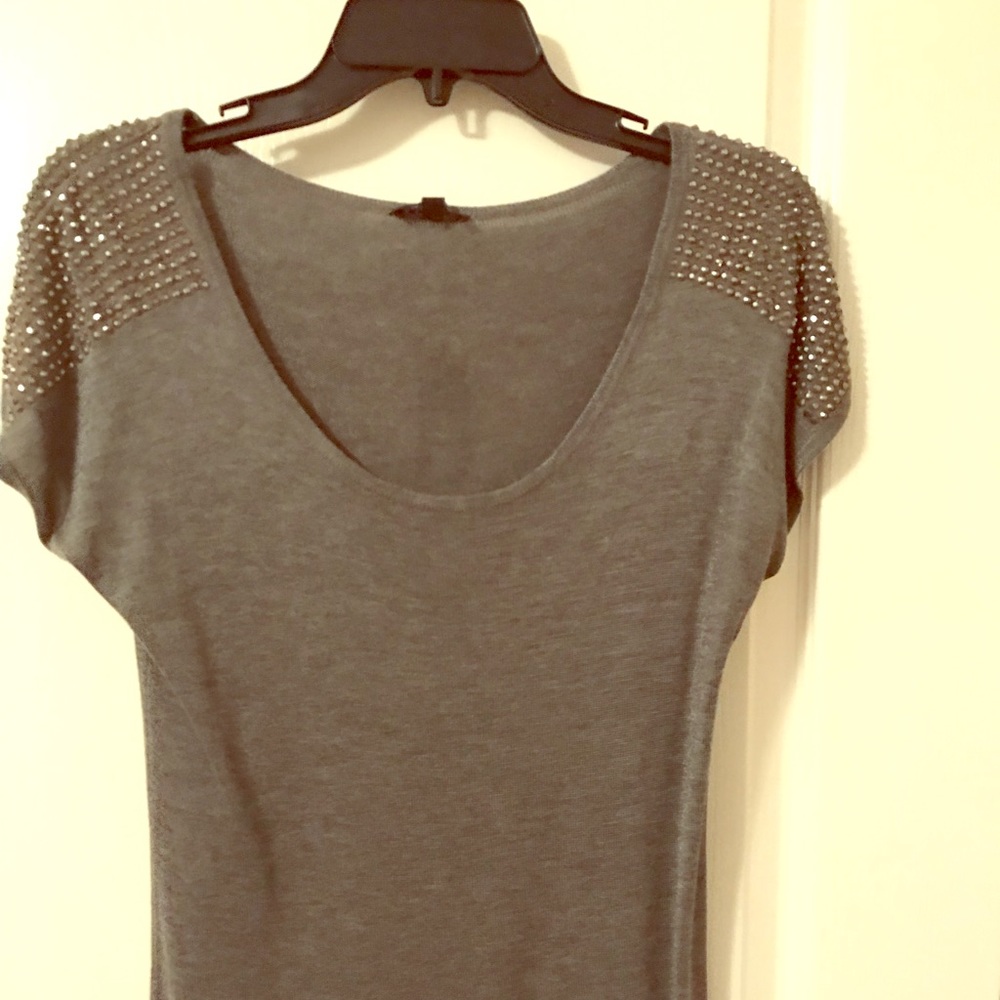 Express fancy top with metal embellishments